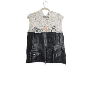 Lace and faux leather corset style top.